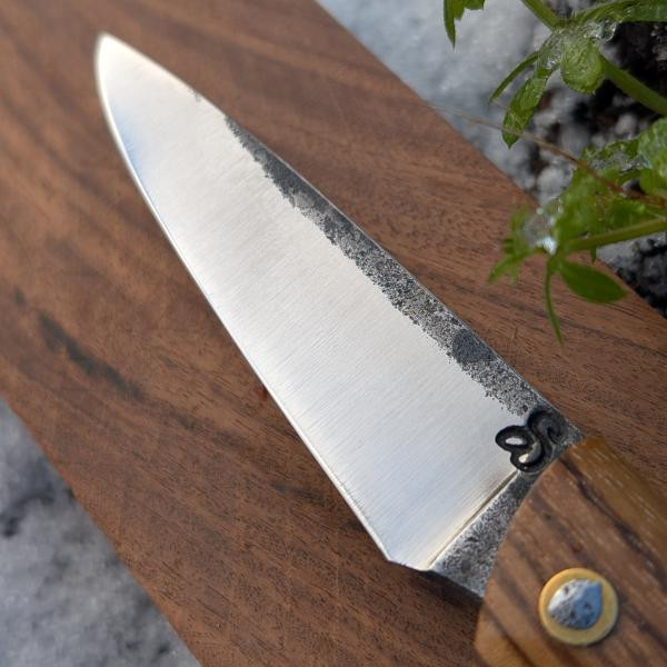 Nagha 399, pliant en zébrano