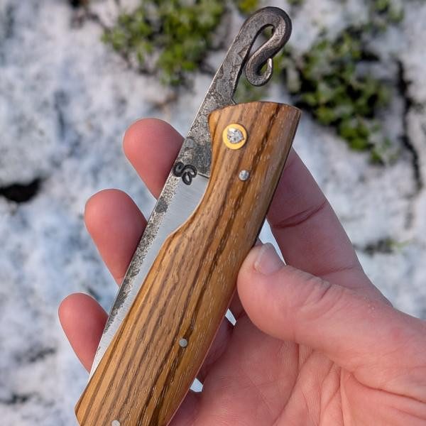 Nagha 399, pliant en zébrano